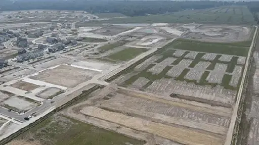 A large field with many different types of land.