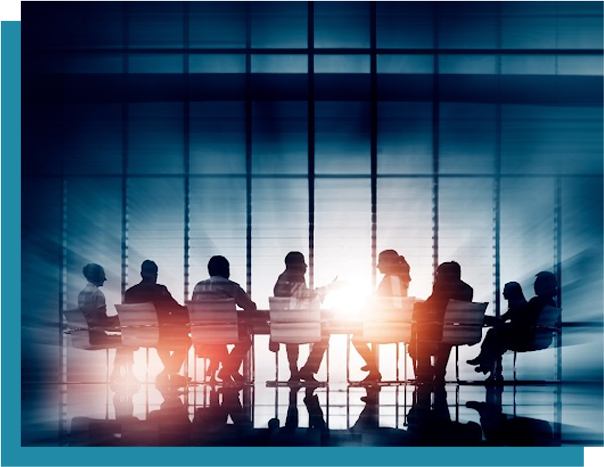 A group of people sitting at a table.